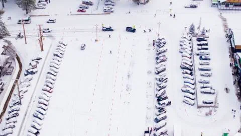 Drone shot of Snow Summit parking lot with new snowfall