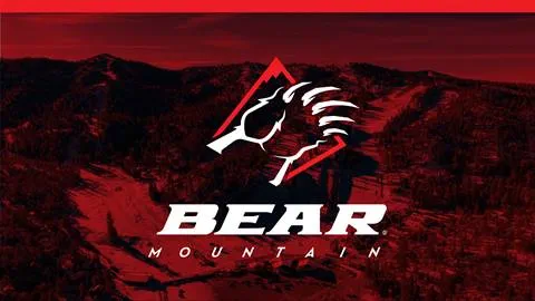 Red overlay on a snow covered mountain top image with the Bear Mountain logo